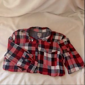 Flannel style, long sleeve, button down.